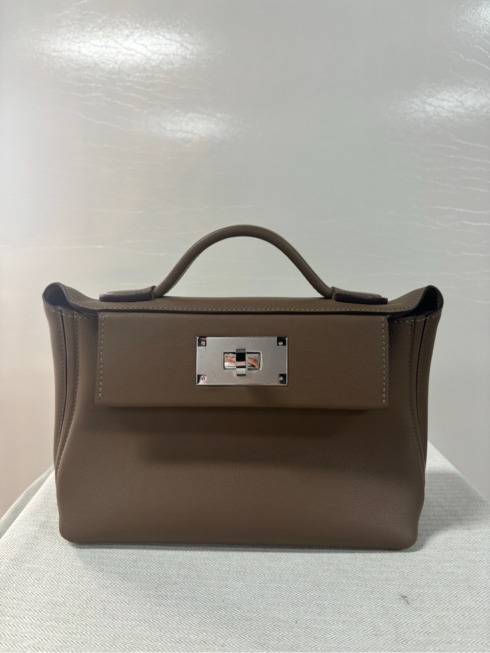 Classic Structured Top-Handle Satchel in Taupe. In the style of 24/24 mini Kelly